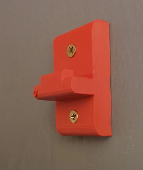 Ophæng der bruges til at hænge lego technic 42096 porsche 911 op. Rød og på væg