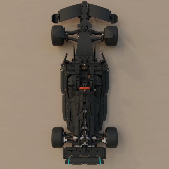 Ophængt lego 42141 formel 1 bil forfra på væg